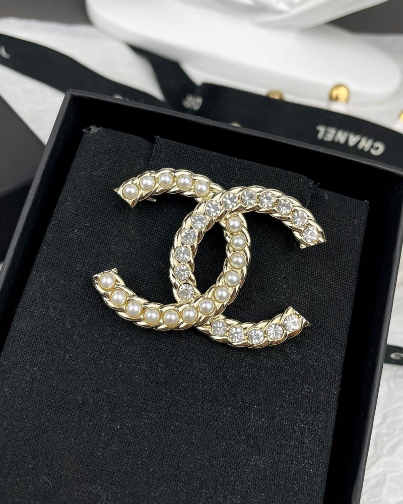 Ch**el brooches